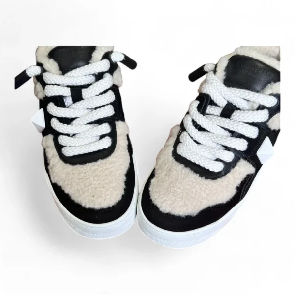 VALENTINO garavani one stud shearling sneaker black and white