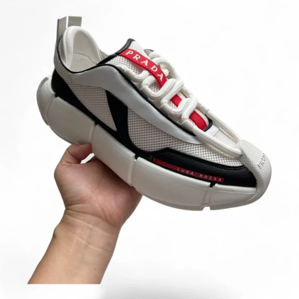 PRADA luna rossa 21 white, black, and red