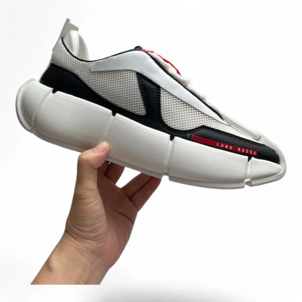 PRADA luna rossa 21 white, black, and red